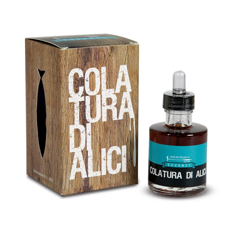 bottle of colatura di alici alongside its packing box